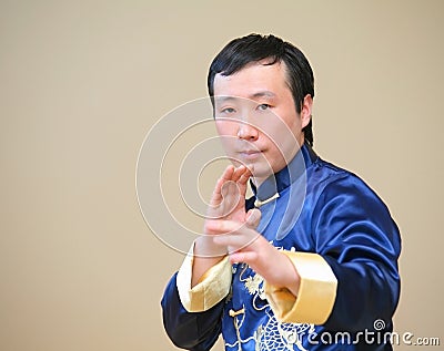 Asian kung-fu fighter Stock Photo