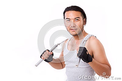 Asian Kung Fu man with chainsticks Stock Photo