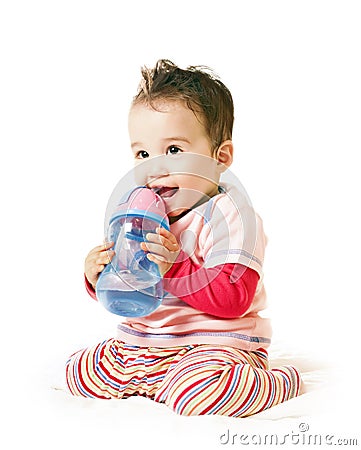 Asian laughing baby boy with spout cup Stock Photo