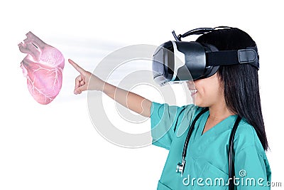 Asian Little Chinese Girl playing doctor with VR goggles Stock Photo