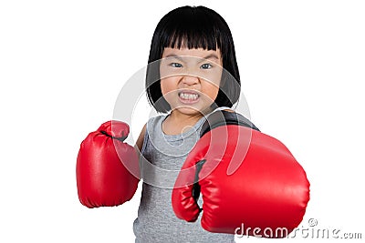 Asian Little Chinese Girl Wearing Boxing Glove With Fierce Expre Stock Photo