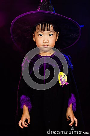 Asian Little Chinese Girl Wearing Halloween Costume Stock Photo