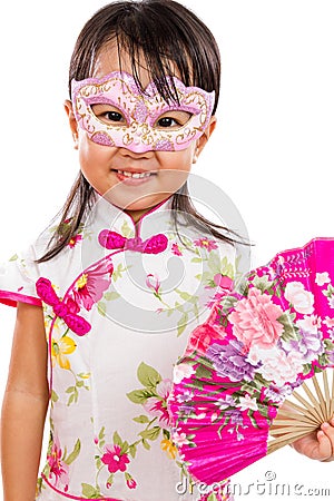 Asian Little Chinese Girl Wearing Mask and Holding Oriental Fan Stock Photo