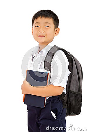 Asian Little School Boy Holding Books with Backpack on White Background Stock Photo