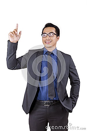 Asian male manager getting an idea on studio Stock Photo