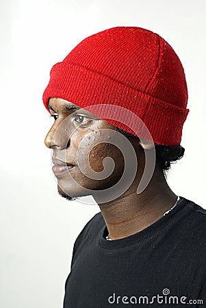 Asian man beanie side portrait Stock Photo