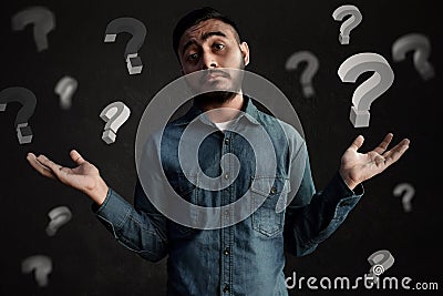 Asian men confused and unsure expression Stock Photo