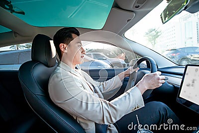 Asian Man Driving Car Stock Photo