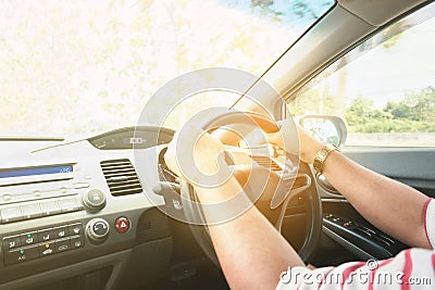 Asian man driving on the road, Vintage filter process style. Stock Photo