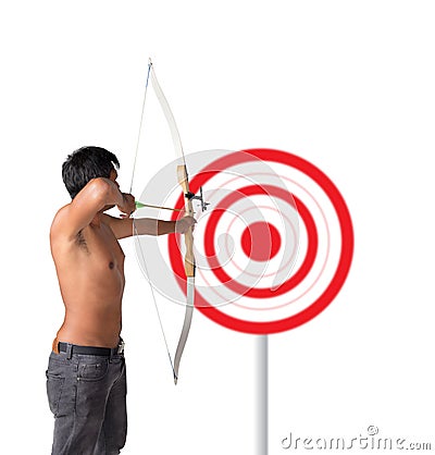 Asian man holding bow and shooting to archery target. Rear view, businessman aiming at target Stock Photo