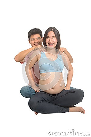 Asian man massage for pregnant wife ,Couples attending antenatal Class together Stock Photo