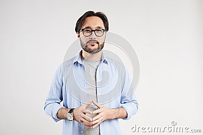 Asian man speculating about problem Stock Photo