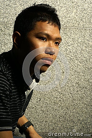 Asian man thinking Stock Photo