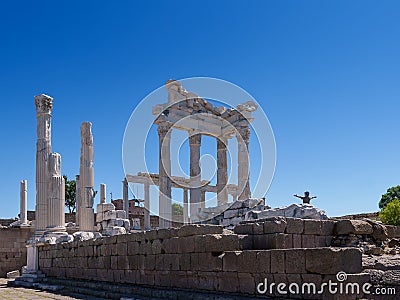 Asian man tourist Standing and asking for blessing from god according to belief in Altar of Zeus, Temple of Trajan Acropolis of Stock Photo