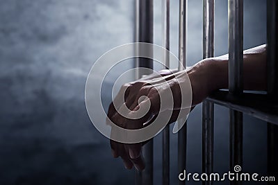 Man trapped in prison Stock Photo