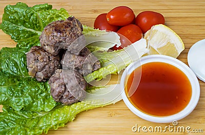 Asian meatballs with sauce Stock Photo