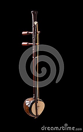 an Asian musical instrument fiddle in black background Stock Photo