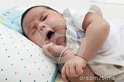 asian newborn yawning Stock Photo