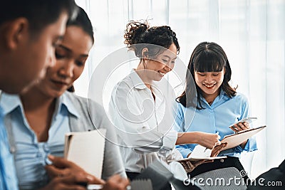 Asian office worker with smile working together in office. Meticulous Stock Photo