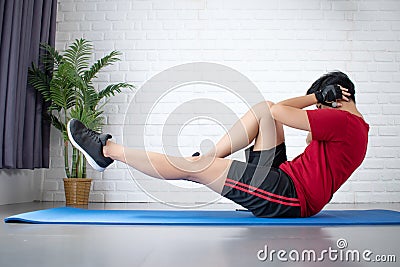 Asian people exercise at home. Concepts of exercise sports Stock Photo