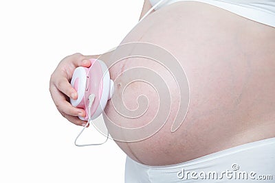Asian pregnant woman check fetal heart sound her belly Stock Photo