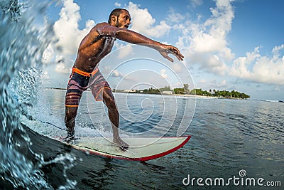 Asian professional surfer rides the ocean wave Stock Photo