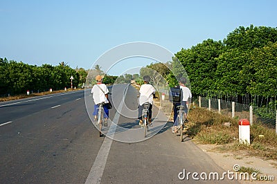 Asian pupil ride bicycle Editorial Stock Photo