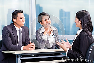 Asian recruitment team hiring candidate in job interview Stock Photo