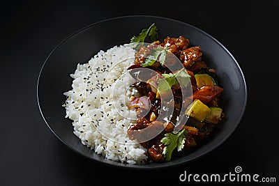 asian rice on a black background Stock Photo