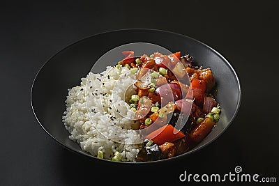 asian rice on a black background Stock Photo