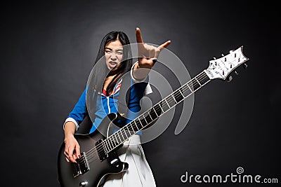 Asian rock star lady in studio Stock Photo