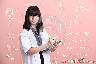 Asian scientist taking note on tablet Stock Photo