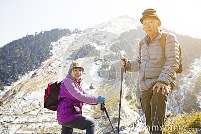 Senior couple hiking on the mountain Stock Photo