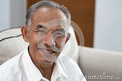 Portrait of asian oldman smile when look at the camera Stock Photo