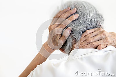Asian senior woman suffering from scruff pain,occipital bone,stiffness neck,elderly female with painful in the nape of the neck Stock Photo