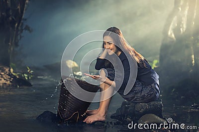 Asian sexy woman working at streams Stock Photo