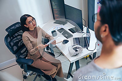 Asian software developer discussion about coding project on computer screen at moden office Stock Photo