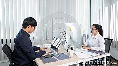 Asian Software engineer Programmer team working together on project of the System Coding New Application In IT Company Office Stock Photo