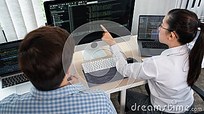 Asian Software engineer Programmer team working together on project of the System Coding New Application In IT Company Office Stock Photo