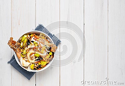Asian style noodles with vegetables, chicken and teriyaki sauce Stock Photo