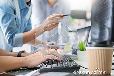 Asian team Outsource Developer Looking Screen Programming Code W Stock Photo