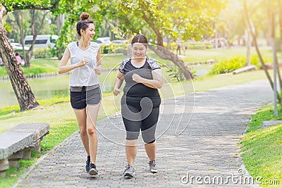 Asian teen running fat and thin friendship jogging Stock Photo