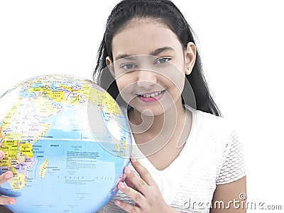 Asian teenage girl with a globe Stock Photo