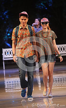 Asian teenage model wearing batik at fashion show runway Editorial Stock Photo