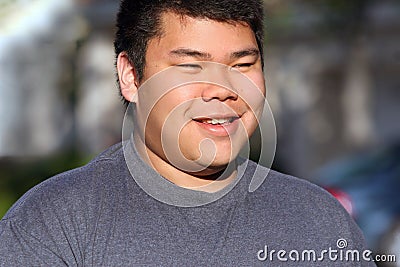 Asian teenager outdoors Stock Photo