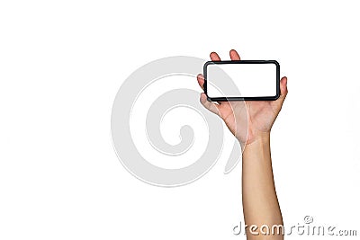 Asian Thai male isolated hand hold Smart mobile phone and raise up in horizontal direction with empty copy space on white Stock Photo