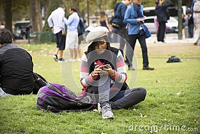 Asian thai woman sit and posing on grass garden for take photo Editorial Stock Photo