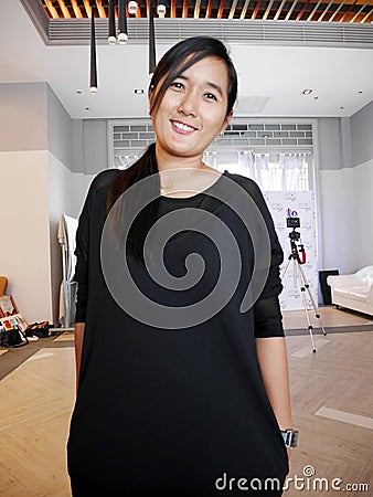 Asian thai woman travel and posing for take photo inside hall Editorial Stock Photo