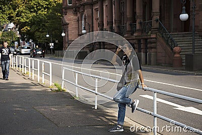 Asian thai woman traveler posing for take photo at beside road Editorial Stock Photo