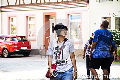 Asian thai women traveler walking visit and take photo Editorial Stock Photo